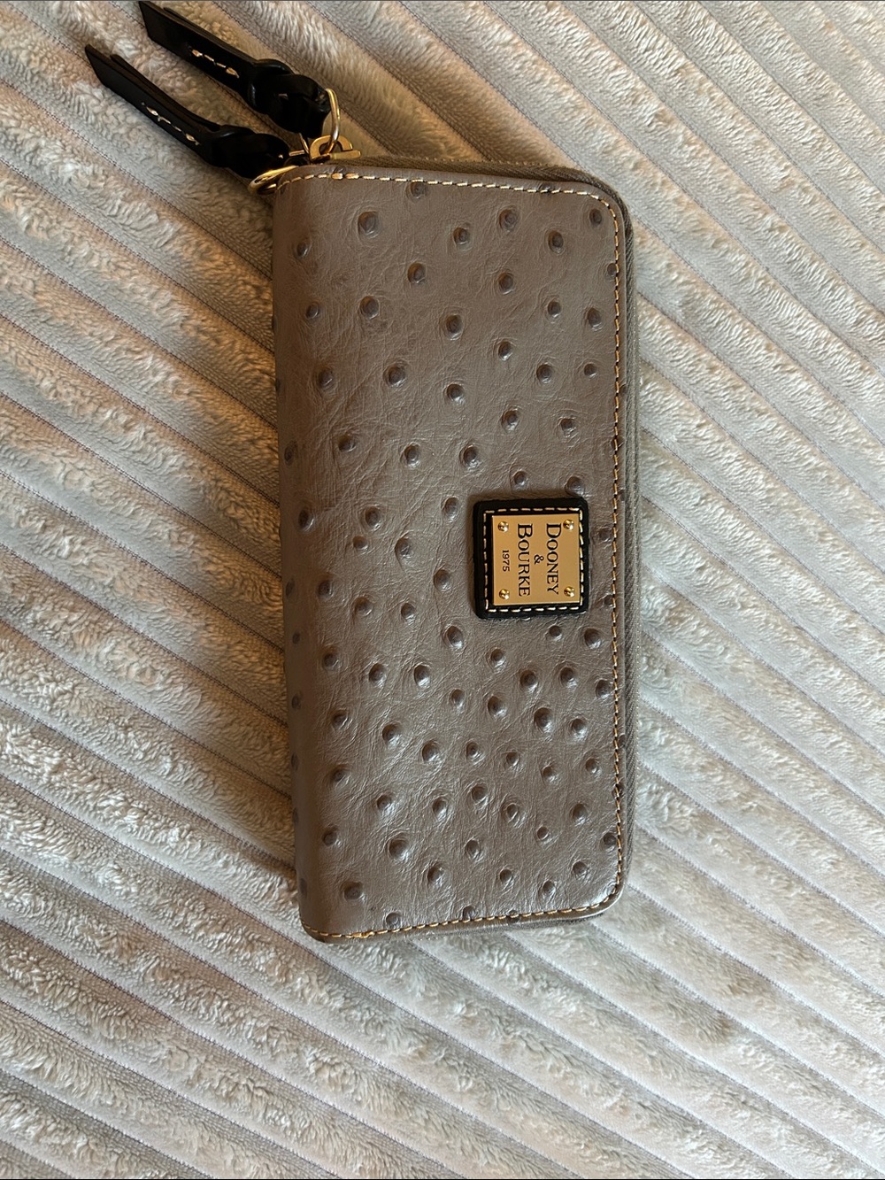 Dooney & Bourke Taupe Ostrich-Embossed Zip Phone Wallet with Wrist Strap